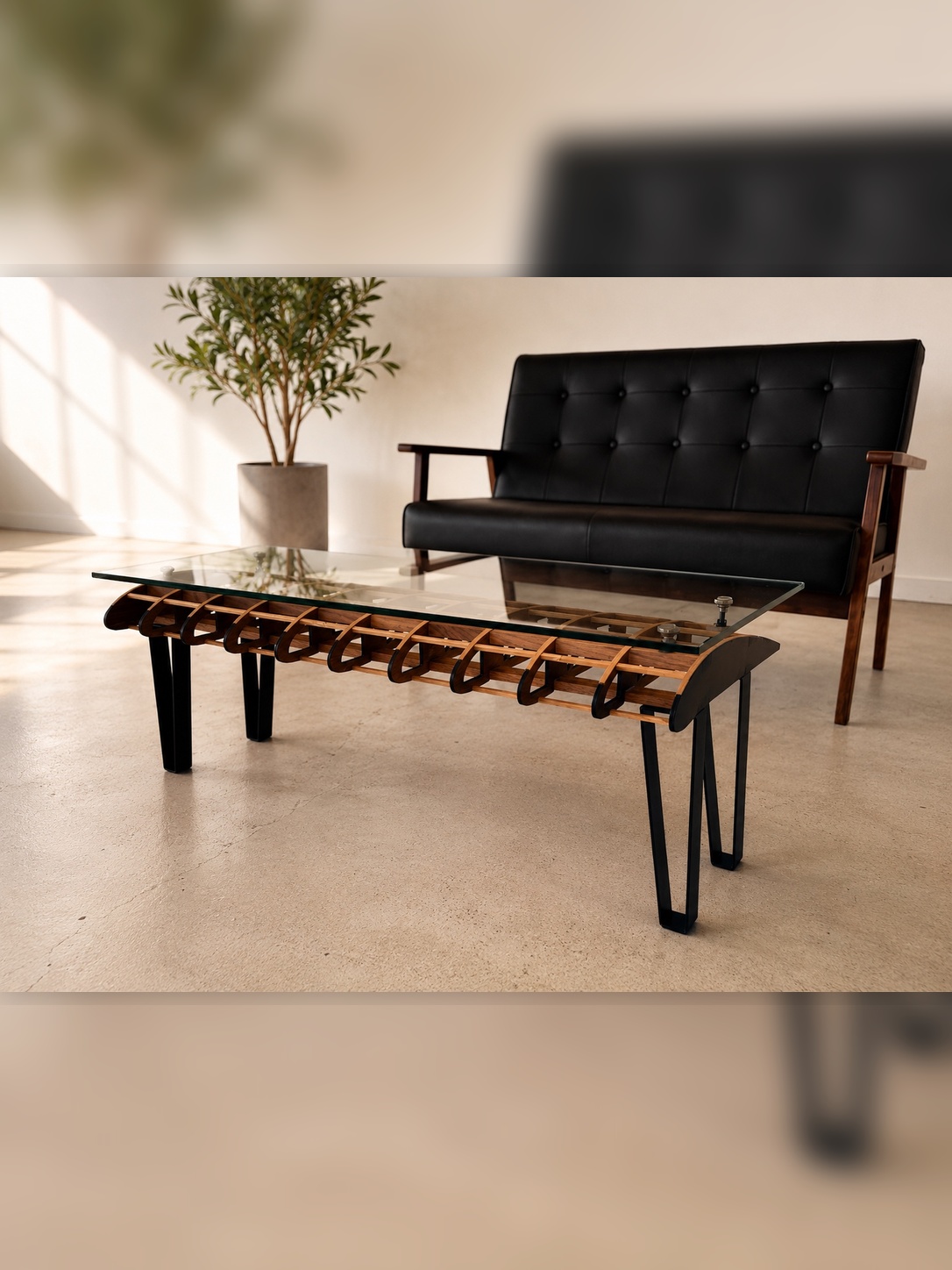 Flightline Furniture Short
                      Final wing rib coffee table — right side view styled with black sofa and potted tree —
                      Corvallis Oregon