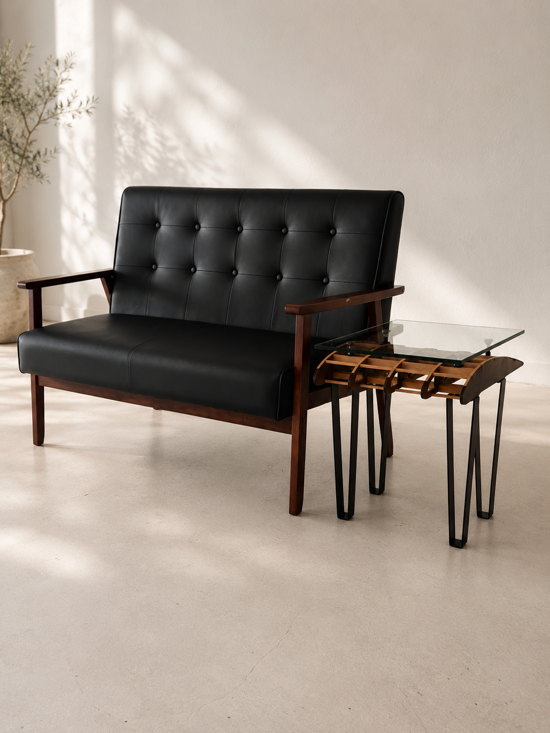 Flightline Furniture Side Slip wing rib
                  accent table — left side view alongside black sofa — Corvallis Oregon